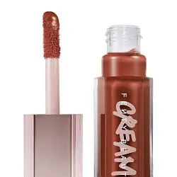 Get the best price in Bangladesh for Fenty Beauty Gloss Bomb Cream Color Drip Lip Cream - a luxurious lipstick and lip gloss hybrid. Buy online now for a stunning liquid gloss finish! - Lavishta